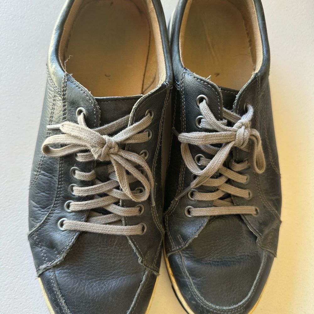 Cole Haan Black Leather Sneakers with Classic Lace-Up Design